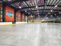 We traveled to Kapolei, Hawaii and inside to resurface two inline skate hockey rinks with Versacourt Speed Indoor tile. This is a look at most of the rink floor before resurfacing began.