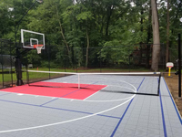 Silver and red residential multicourt with basketball and pickleball in Topsfield, MA.