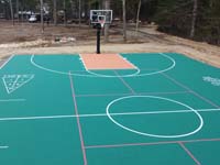 Multicourt with basketball, pickleball, shuffleboard and hoscotch as part of complete revamp of Yogi Jellystone Cranberry Campground in Cartver, MA.