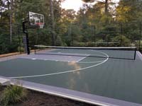 Backyard basketball court is the sort of thing you might find in Andover, MA or a yard like yours.