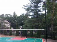 Backyard basketball court in Pembroke, MA. Whatever your sport, you could have a court surface and accessories of your own in Westford, Billerica, Wilmington, Tewksbury or Chelmsford.