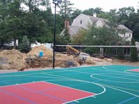 Ergonomic sport tile court for basketball, tennis and volleyball in Pembroke, MA.