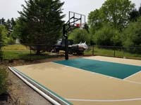 Off-white, tan, sand, beige, ecru? Whatever you call it, looks great with green on a home basketball court in Easton, MA.