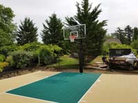 Off-white, tan, sand, beige, ecru? Whatever you call it, looks great with green on a home basketball court in Easton, MA.