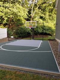Slate green and titanium basketball court in Needham, MA.