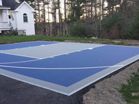 Blue tile court on a South Shore driveway in Massachusetts.