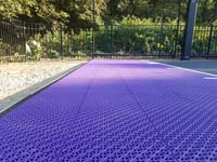 Small purple and black basketball court in Stoneham, MA.
