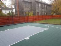 Backyard basketball court is the sort of thing you might find in Wakefield, MA or a yard like yours.