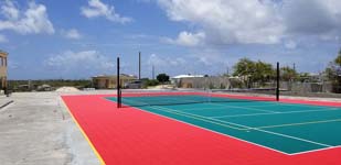 Replacement tennis and basketball courts in Codrington, Barbuda, courtesy of Australia, the Red Cross, and community effort, part of the ongoing recovery from hurricane Irma.