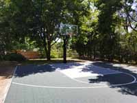 Rhode Island backyard basketball court on concrete base in Barrington.