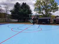 Expanse of back yard where basketball and hockey multicourt will go in Burlington, MA.