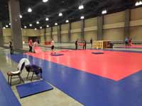 Indoor game tile volleyball courts for New England Regional Volleyball Association (NERVA) Winterfest 2020 tournament in Hartford, CT. Here's some of the court installation process.
