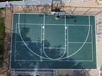 Overhead view of backyard basketball and pickleball court in all green, in Foxborough, MA.