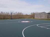 Basketball court resurfaced to include pickleball lines in Siasconset, MA, on Nantucket, at Sankaty Head Foundation Caddie Camp.