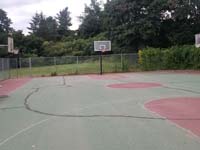 Old Paxton, MA municipal court before resurfacing and replacement of old hoops.