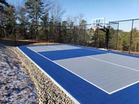 Home pickleball court with basketball in Plymouth, MA.