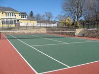Large rust red and green tennis court in Newport, RI, on Aquidneck Island..