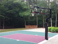 Green and burgundy half-court basketball near Rhode Island and Cape Cod, in Dartmouth, MA..