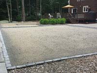 Packed surface ready for base and basketball court installation integrated with patio Dartmouth, MA