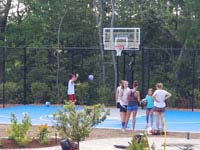 Friends at new backyard basketball court in Easton, MA.