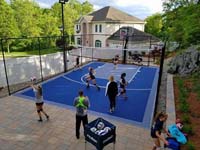 Custom court in Stoneham meant primarily for volleyball, with basketball for mulitcourt usage.