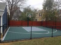 Backyard basketball court is the sort of thing you might find in Wakefield, MA or a yard like yours.