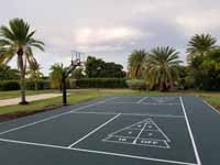 Combination court for pickleball, shuffleboard and some basketball installed on Jumby Bay Island (Long Island) in Antigua. Portable pickleball net coming soon.